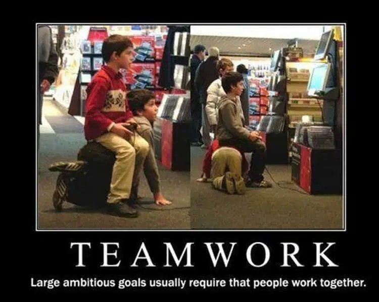 kids in an arcade taking turns playing games while sitting on each other